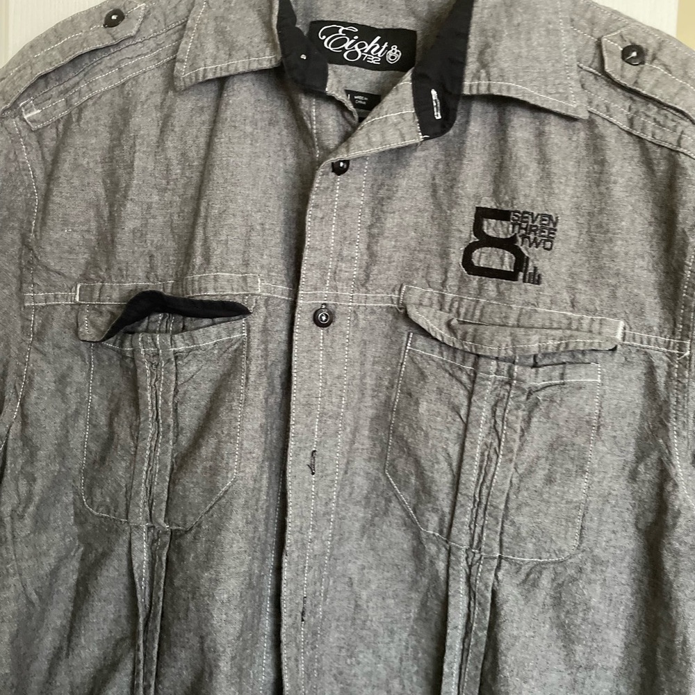 Gray button down shirt with a pocket